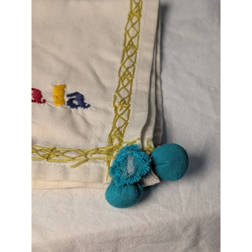 Set of 4 Fa La La Embroidered Christmas Napkins Cream with Teal Pom Tassels